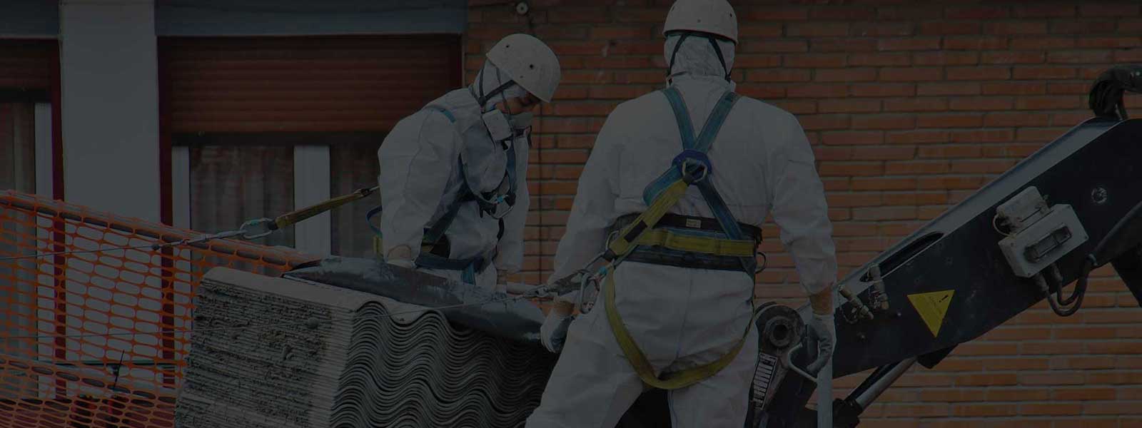 Carrying Stack of Corrugated Asbestos