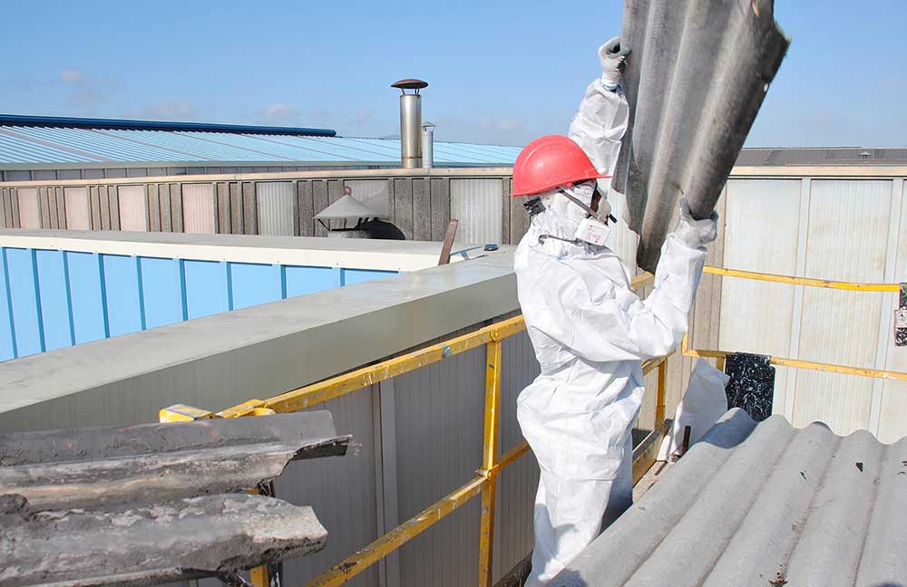 Piling Asbestos on Commercial Building